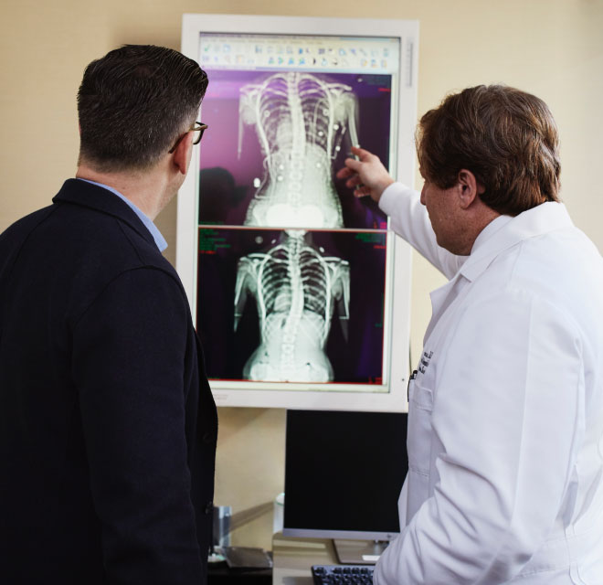 Two doctors looking at an Xray, Diagnostic Imaging in Montana