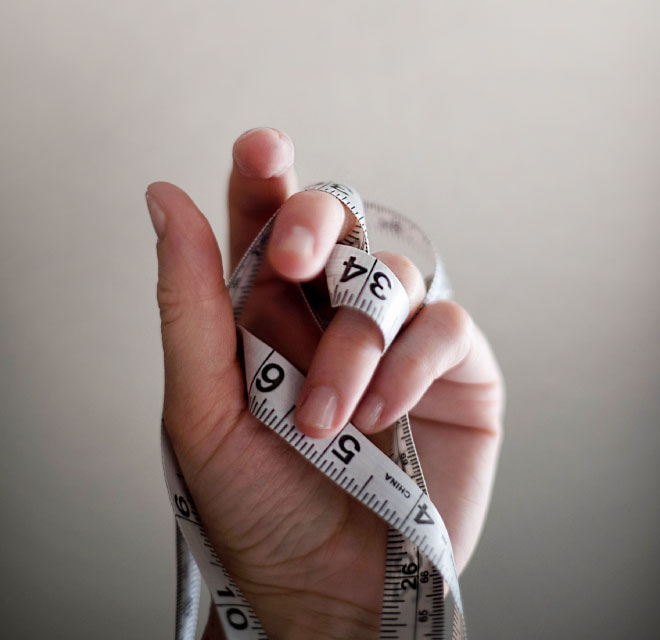 Tape measure being held, Weight Loss in Montana